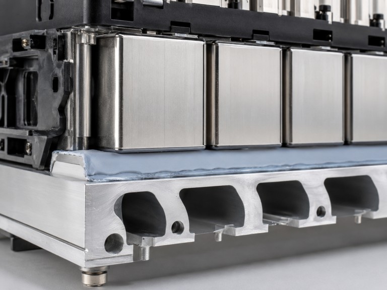 Gap filler thermal pad between battery cells and aluminum cooling plate