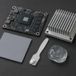 Thermal interface materials for dissipating heat in electronics, including a thermal pad, grease, and gel beside a heat sink